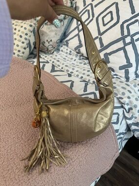 Coach Gold Shoulder Hobo Bag with Tassel with inspire coach charm